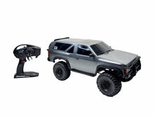 Load image into Gallery viewer, Traxxas TRX-4 1/10 Scale Rock Crawler W Silver Nissan Pathfinder Body Rtr #19043