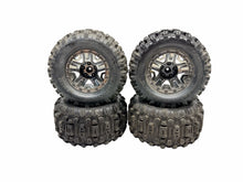 Load image into Gallery viewer, Traxxas Hoss 4X4 VXL Sledgehammer Tires W 12MM Hex Black Chrome Wheels #19946
