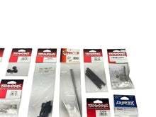 Load image into Gallery viewer, Traxxas Lot Of 23 Random NIP Parts &amp; 1 Open Rc Part #14539
