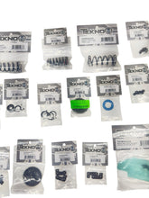 Load image into Gallery viewer, Random Lot Of 21 New In Package Tekno Parts ($150 Retail) Rc Part #16084
